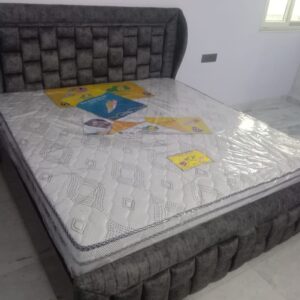Upholstery Double bed with White Head Cushion